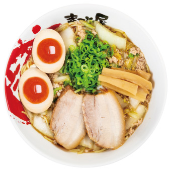 chichen soup ramen with a boiled egg on top